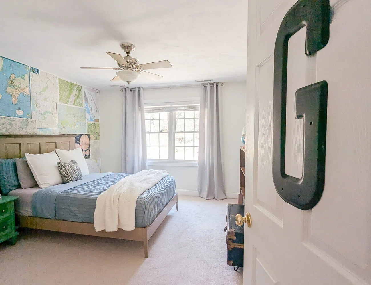 looking through door into boy's travel bedroom.