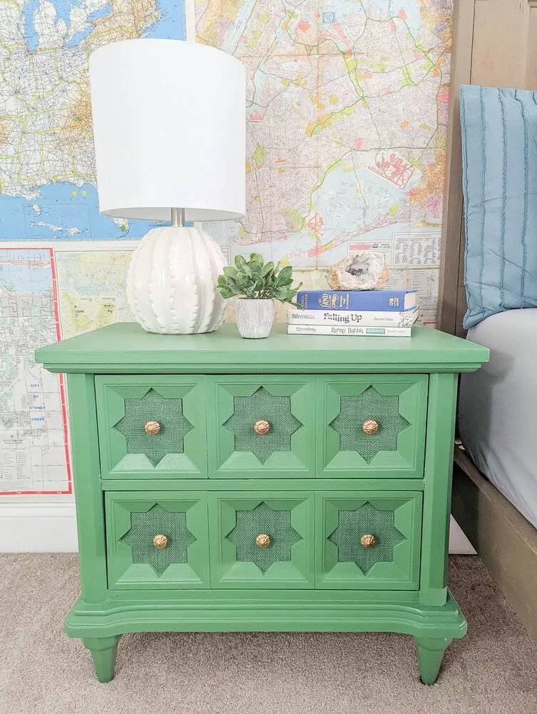 green nightstand with gold hardware.