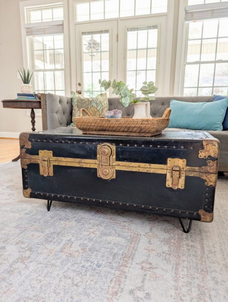diy upcycled coffee table made from an old military trunk.