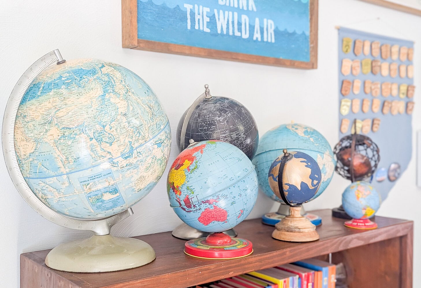 colleciton of new and old globes.