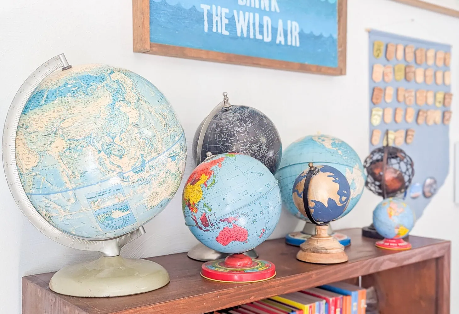 colleciton of new and old globes.
