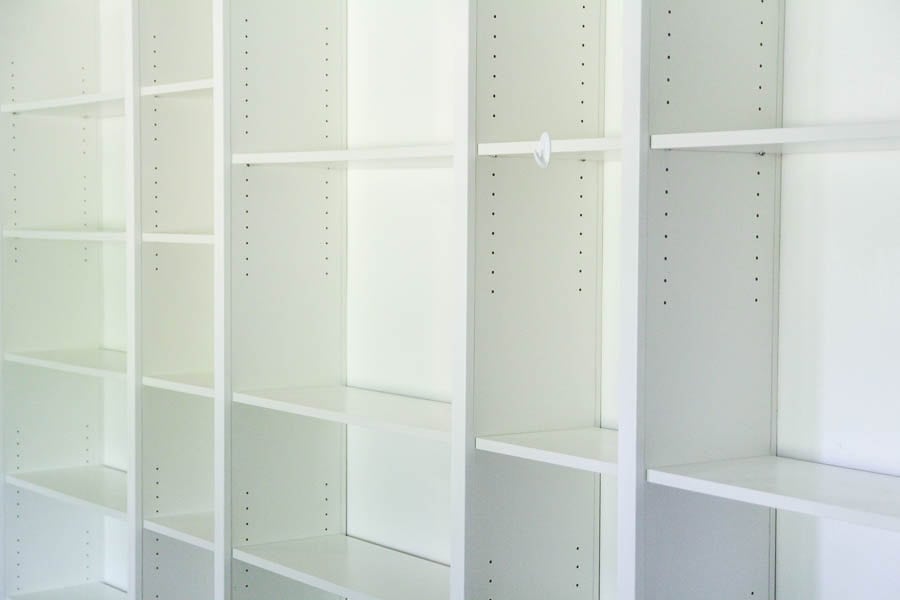 IKEA billy bookcases with lots of holes for adjustable shelving.