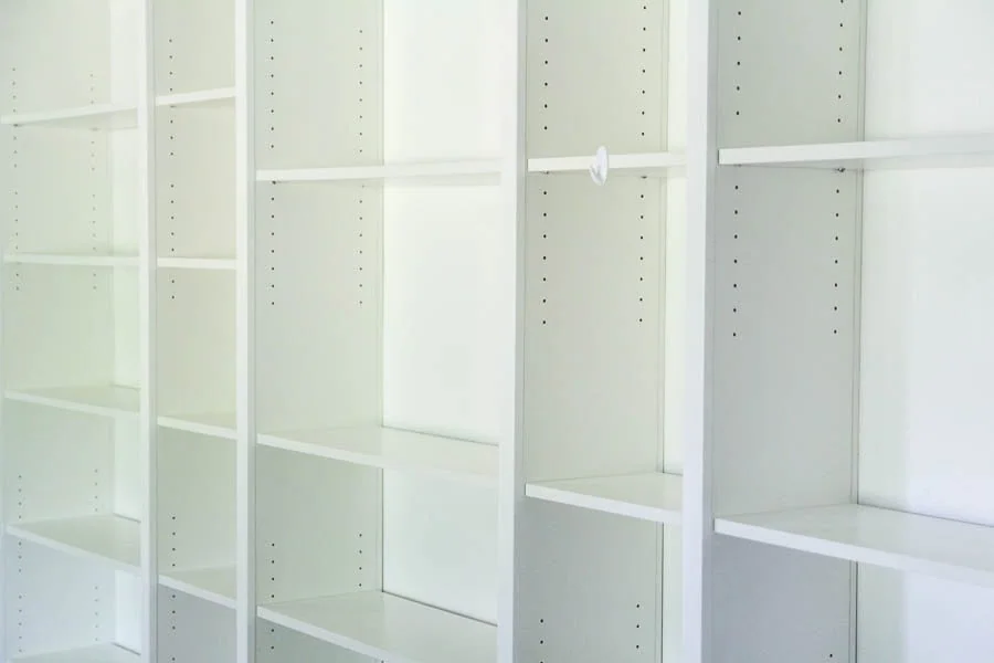 IKEA billy bookcases with lots of holes for adjustable shelving.