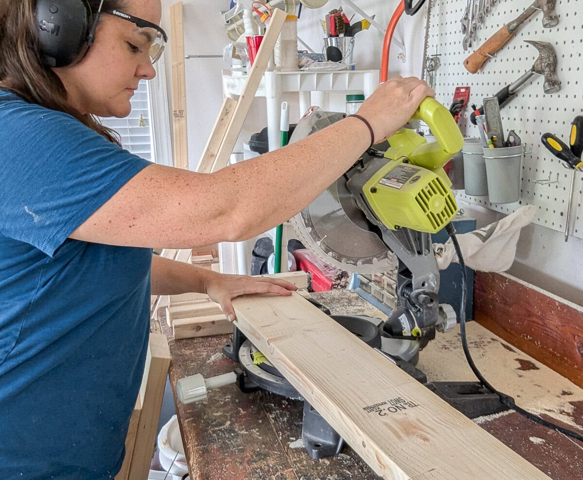 cutting wood with a miter saw.
