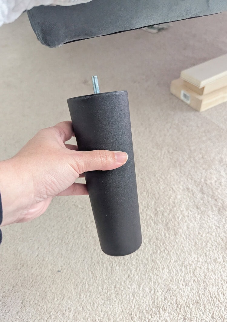 removing plastic bed leg from bed.
