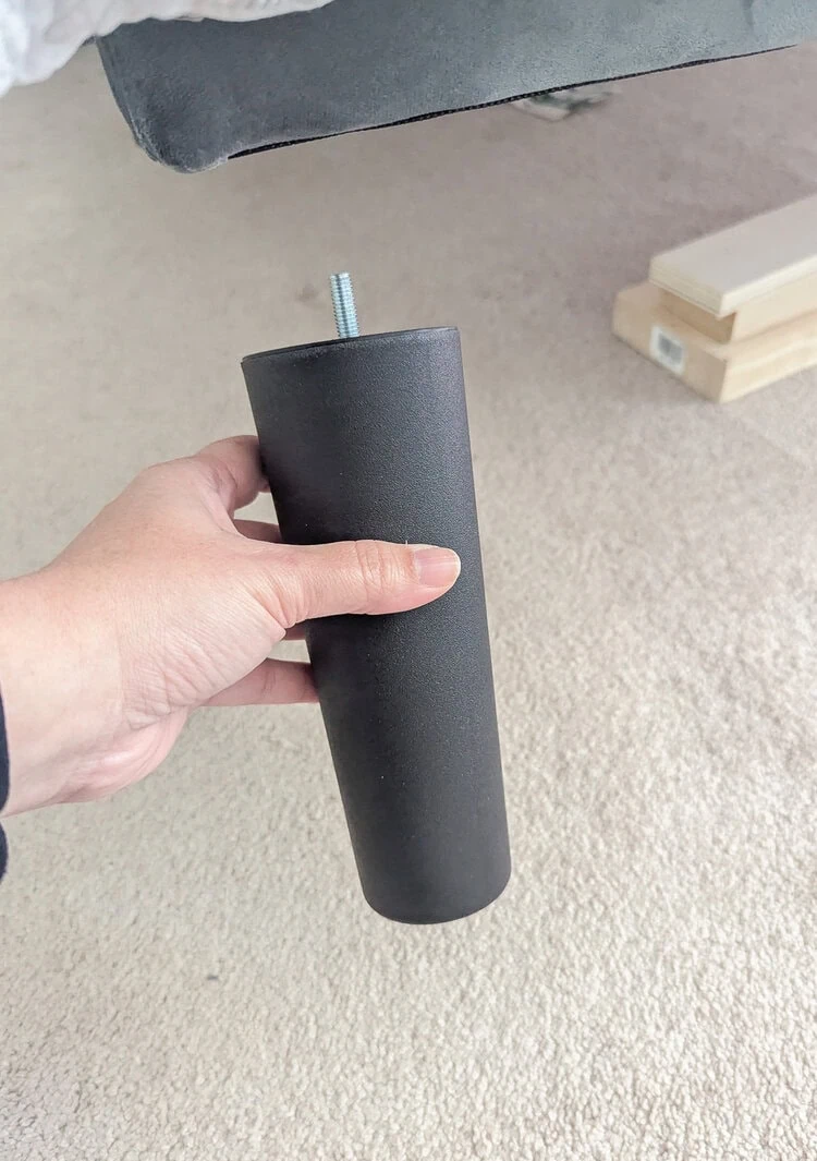 removing plastic bed leg from bed.