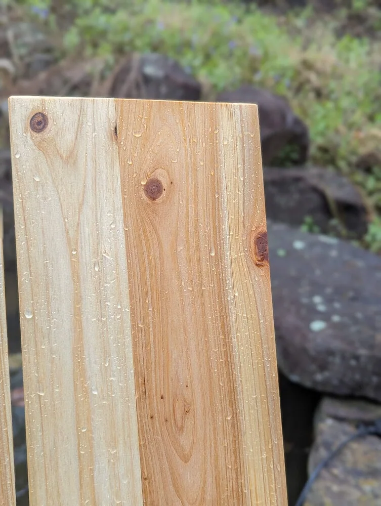 water beading on cedar chair.