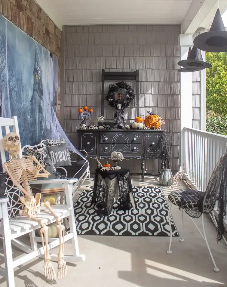 scary Halloween porch with haunted house curtain