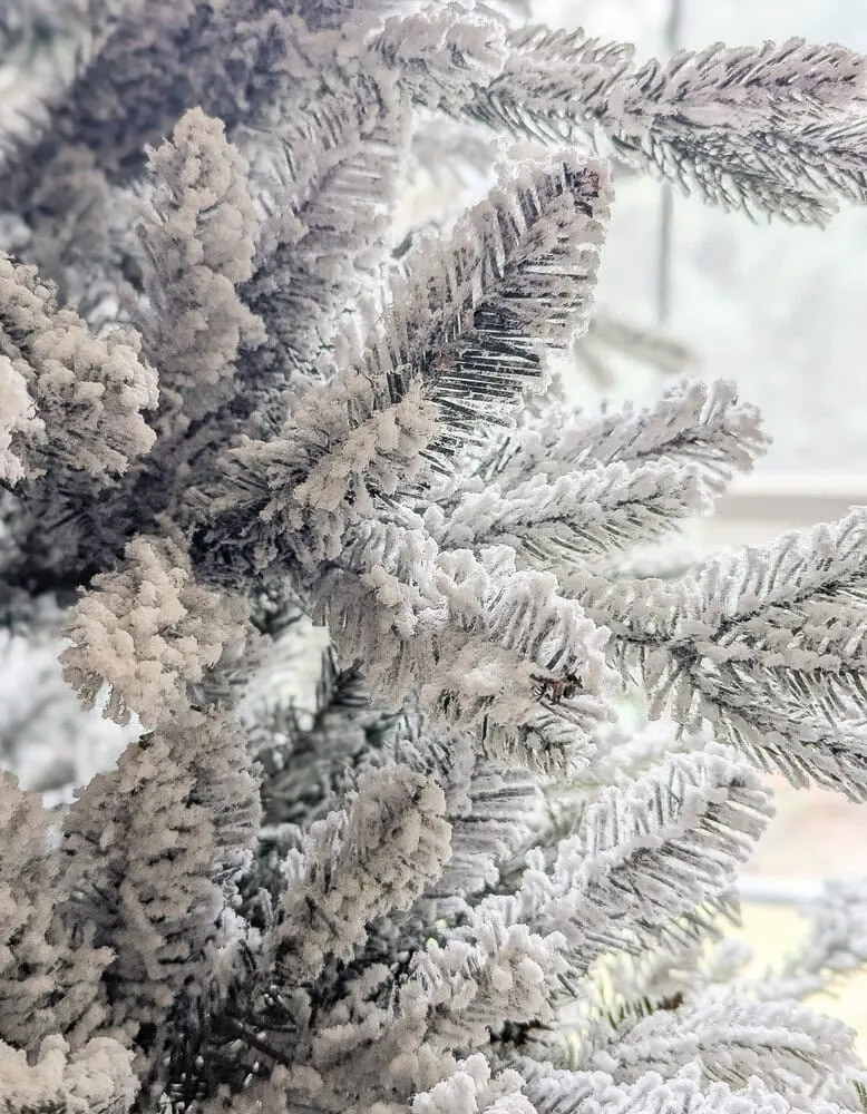close up of the texture of a flocked Christmas tree.